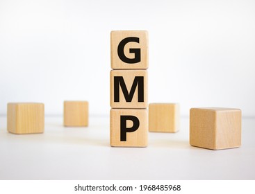 GMP, good manufacturing practice symbol. Concept words 'GMP, good manufacturing practice' on cubes on a beautiful white background. Business and GMP, good manufacturing practice concept. Copy space.