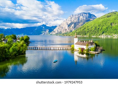 Gmunden Schloss Ort or Schloss Orth on the Traunsee lake aerial panoramic view, Austria. Gmunden Schloss Ort is an Austrian castle founded around 1080 year.