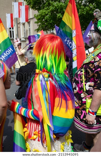 Gniezno,\
Poland - 05.07.2022: Gay parade or Equality March, crowd obserwing\
and people protesting, riot police\
forces.