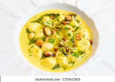 Gnocchi Made With Tarragon Sauce, Herbs And Nuts
