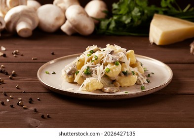 Gnocchi with mushrooms, in cream sauce, Italian dish, horizontal, no people, selective focus, - Powered by Shutterstock