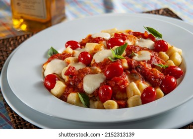 Gnocchi With Pomodoro Sauce, Mozzarella, Cherry Tomatoes And Basil