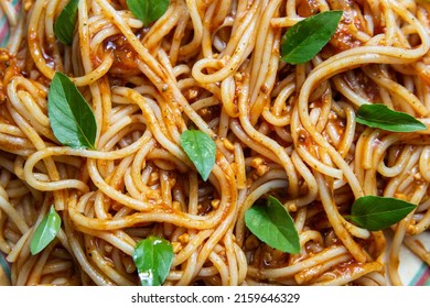 GOIÂNIA GO BRAZIL - MAY 22 2022: Close Up Of A Serving Of Pasta. Texture. Pasta With Tomato Sauce And Some Basil Leaves.