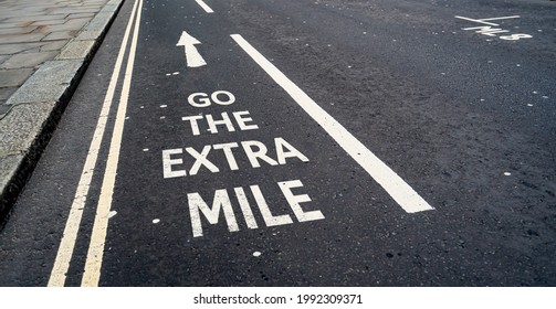 Go the Extra Mile in a cycle lane city street - Shutterstock ID 1992309371
