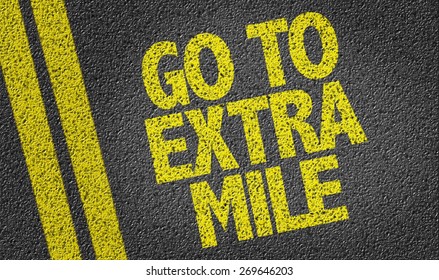 Go To Extra Mile Written On The Road