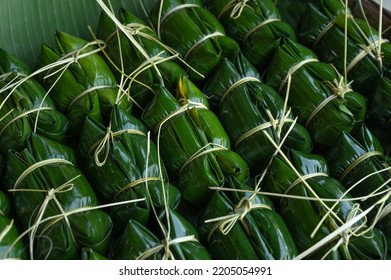 Go Green Concept Pattern. Fresh Green Banana Leaf Packaging. Thai Dessert. Banana With Sticky Rice Top View. Delicious Thai Food. Traditional Thai Dessert. Natural Green Packaging Backgroun.