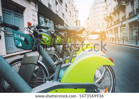 Go green and healthy active lifestyle concept. Bicycle rows in the street.