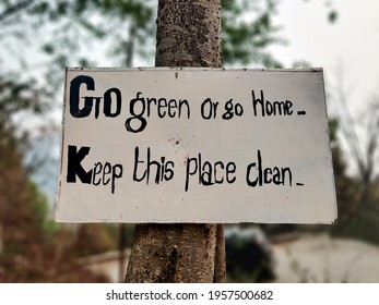 Go Green Or Go Home Sign, Notice Keep This Place Clean Signboard. Protect Nature And Save The Earth.