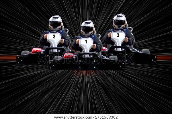 go kart\
indoor, cart racing fast, car where gokarting, we speed racing,\
racers banner. Copy space. Three riders Go kart speed rive indoor\
race on a background with white\
rays.