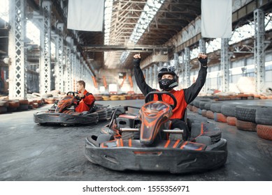 Go Kart Racer Raised His Hands Up, Front View