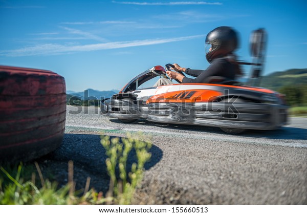 Go\
kart racing Professional Go Kart racing in\
circuit.