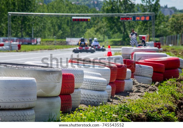 Go kart racing with\
racer