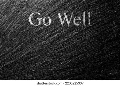 Go Well Chalk Text On Black Stone Slab