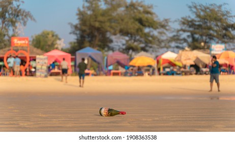 Goa, India - 30 December 2020: Empty Beer Bottle On The Beach