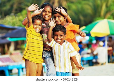GOA, INDIA - JANUARY 14: Poor indian children celebrating Thai Pongal Holiday, January, 14, 2013 in Goa, India. Pongal is a thanksgiving festival. All indian people are very happy on this day. 