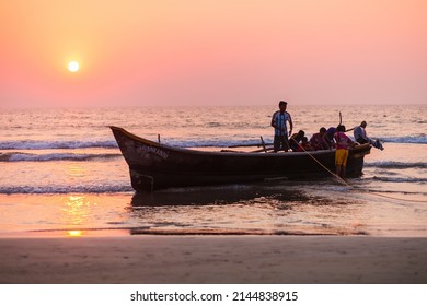 GOA, INDIA - NOVEMBER 18, 2011: Fishermen coming back from the sea with catch in Goa, India