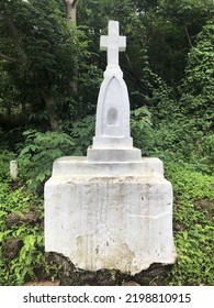 Goa, India - September 7, 2022: Roadside Vintage Roman Catholic Cross. 