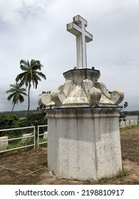 Goa, India - September 7, 2022: Roadside Vintage Roman Catholic Cross. 