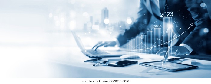 Goal of business new year in 2023, Investor, Businessman analysis economic and calculates financial data and target for long-term investments and profitability in future on digital data network. - Shutterstock ID 2239405919