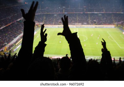 Goal!
Crowd Of Footbal Supporters And Fans Cheer At The Studium. 