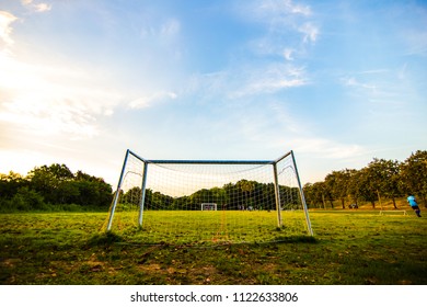 goal football in the park with a sunlight. - Shutterstock ID 1122633806