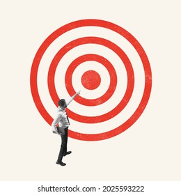 Goal, task. Young man, office worker, employee standing in front of target isolated on light background. Concept of finance, economy, goals, achievements, occupation. Copy space for ad - Shutterstock ID 2025593222