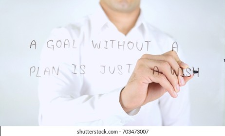 A Goal Without a Plan is Just a Wish, Man Writing on Glass, Handwritten