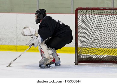 Goalie In His Net During An Ice Hockey Game