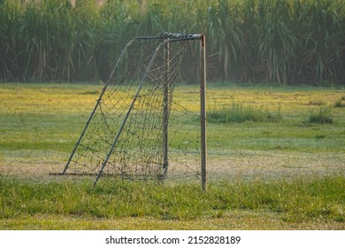 Goalpost the size of a child on the grass