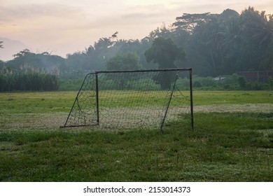 Goalpost the size of a child on the grass