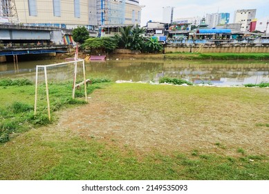 goalposts at a soccer field by the river in Jakarta         