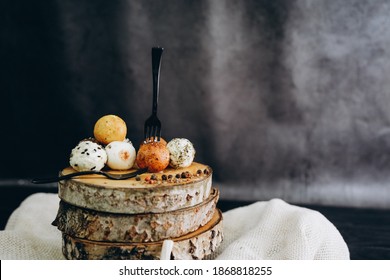 Goat Craft Cheese Balls With Spices On A Dark Background. Truffle Cheese