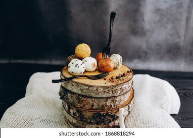 Goat Craft Cheese Balls With Spices On A Dark Background. Truffle Cheese