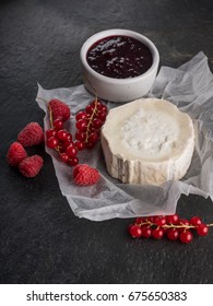 Goat cream cheese tasting assorted with berries and fruit jam, big size resolution. Food banner for text or design. Side view photo, overhead. - Shutterstock ID 675650383
