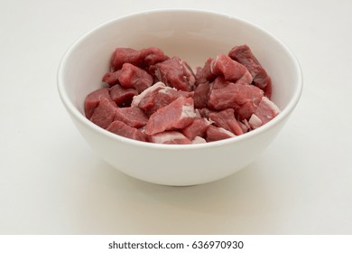 Goat Meat Pieces In Bowl On The White Background