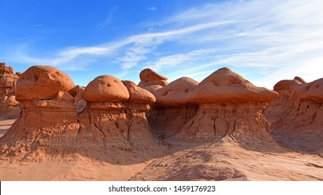 Goblin Valley Utah State Parks. Goblin Valley State Park Is Inhabited By Strange And Unique Rock Sculptures, Carved By Wind And Water, That Suggest Mischievous Goblins And Phantasmagoric Creatures