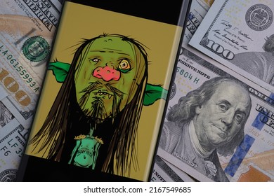 Goblintown 5948 Character  Seen On Smartphone Placed On Dollars. Goblin Town NFT Digital Art Collection. Stafford, United Kingdom, June 14, 2022
