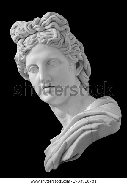 God Apollo bust\
sculpture. Ancient Greek god of Sun and Poetry Plaster copy of a\
marble statue isolated on\
black