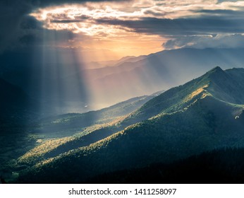 God Rays on forest moutains - Sunrise