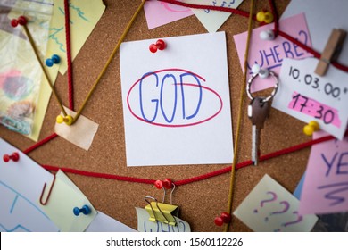 God Search Concept. Close-up View Of A Detective Board With Evidence. In The Center Is A White Sheet Attached With A Red Pin With The Text God.