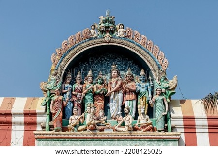 God Shiva weds Parvathi in the presence of Vishnu, Bramah, Naradha and other rishis. An excellent detailed sculpture made out of lime mortar at ancient Perur shiva temple in Coimbatore, Tamilnadu
