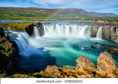 The Godafoss (Icelandic: waterfall of the gods) is a famous waterfall in Iceland. The breathtaking landscape of Godafoss waterfall attracts tourist to visit the Northeastern Region of Iceland. - Shutterstock ID 1338250610
