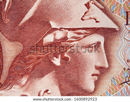 Goddess Athena on old Greece 100 drachma (1978) banknote close up macro. Vintage engraving. Ancient Greek Olympian deity, goddess of wisdom, craft, and war. 