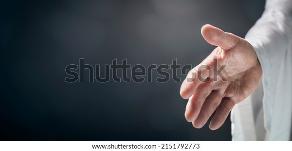 Gods or Jesus\
Christ hand reaching out, religion, salvation, forgiveness, \
atonement and love concept