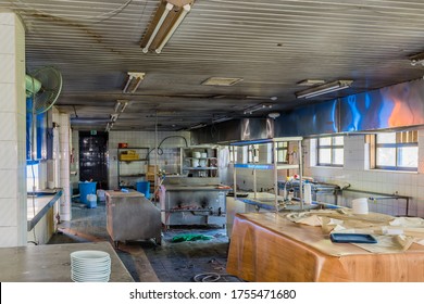 Goesan, South Korea; May 29, 2020: Grungy, dirty kitchen full of equipment deserted at abandoned ski resort.