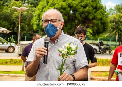 GOIANIA GOIAS BRAZIL - JANUARY 22 2021: Demonstration calling for the impeachment of Bolsonaro. Man wearing mask speaking into the microphone during a protest.