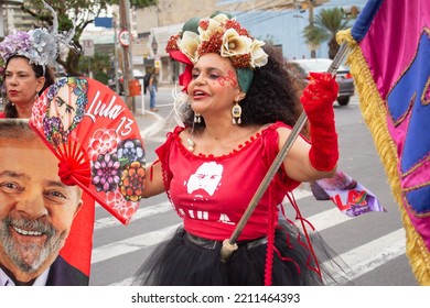 GOIANIA GOIAS BRAZIL - SEPTEMBER 28 2022: A Woman In Red Clothes Dancing In The Street. Photo Taken During A Performance In Favor Of The Presidential Candidate Of Brazil, Lula.