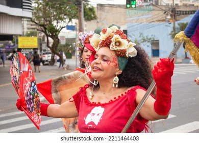 GOIANIA GOIAS BRAZIL - SEPTEMBER 28 2022: A Woman In Red Clothes Dancing In The Street. Photo Taken During A Performance In Favor Of The Presidential Candidate Of Brazil, Lula.