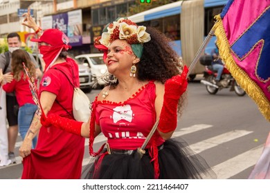 GOIANIA GOIAS BRAZIL - SEPTEMBER 28 2022: A Woman In Red Clothes Dancing In The Street. Photo Taken During A Performance In Favor Of The Presidential Candidate Of Brazil, Lula.