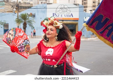 GOIANIA GOIAS BRAZIL - SEPTEMBER 28 2022: A Woman In Red Clothes Dancing In The Street. Photo Taken During A Performance In Favor Of The Presidential Candidate Of Brazil, Lula.